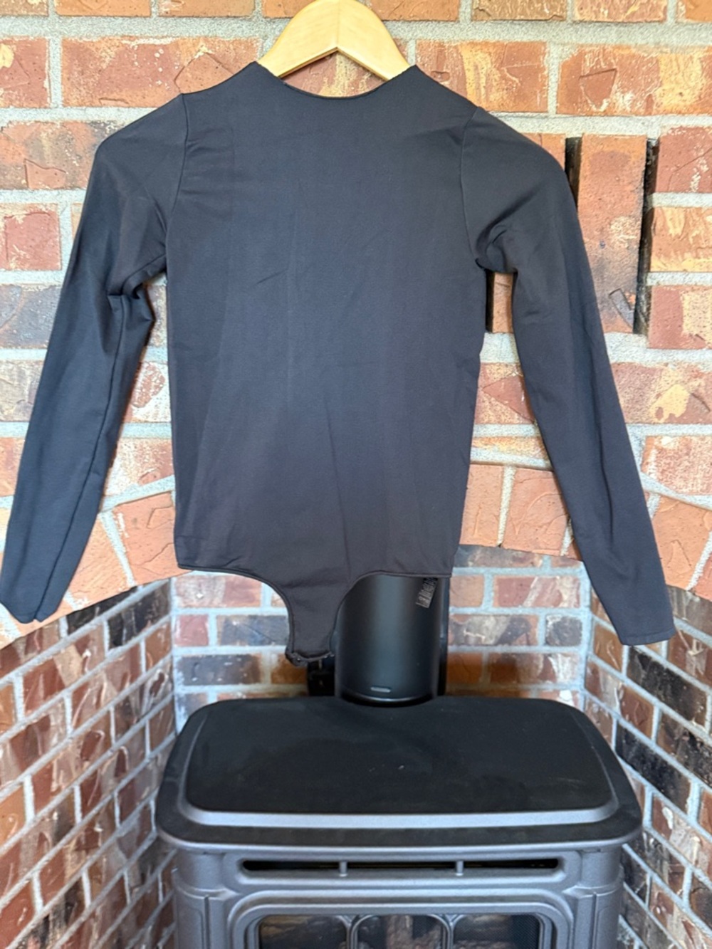 SKIMS Black Seamless Bodysuit raw neckline, long sleeve, thong style black l/XL